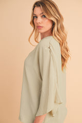 Parchment Solid Color Crinkled V Neck Ruffled Sleeve Blouse